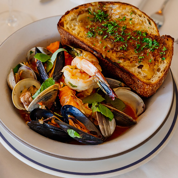 Clark’s Cioppino with fresh clams, oysters, and lobster.